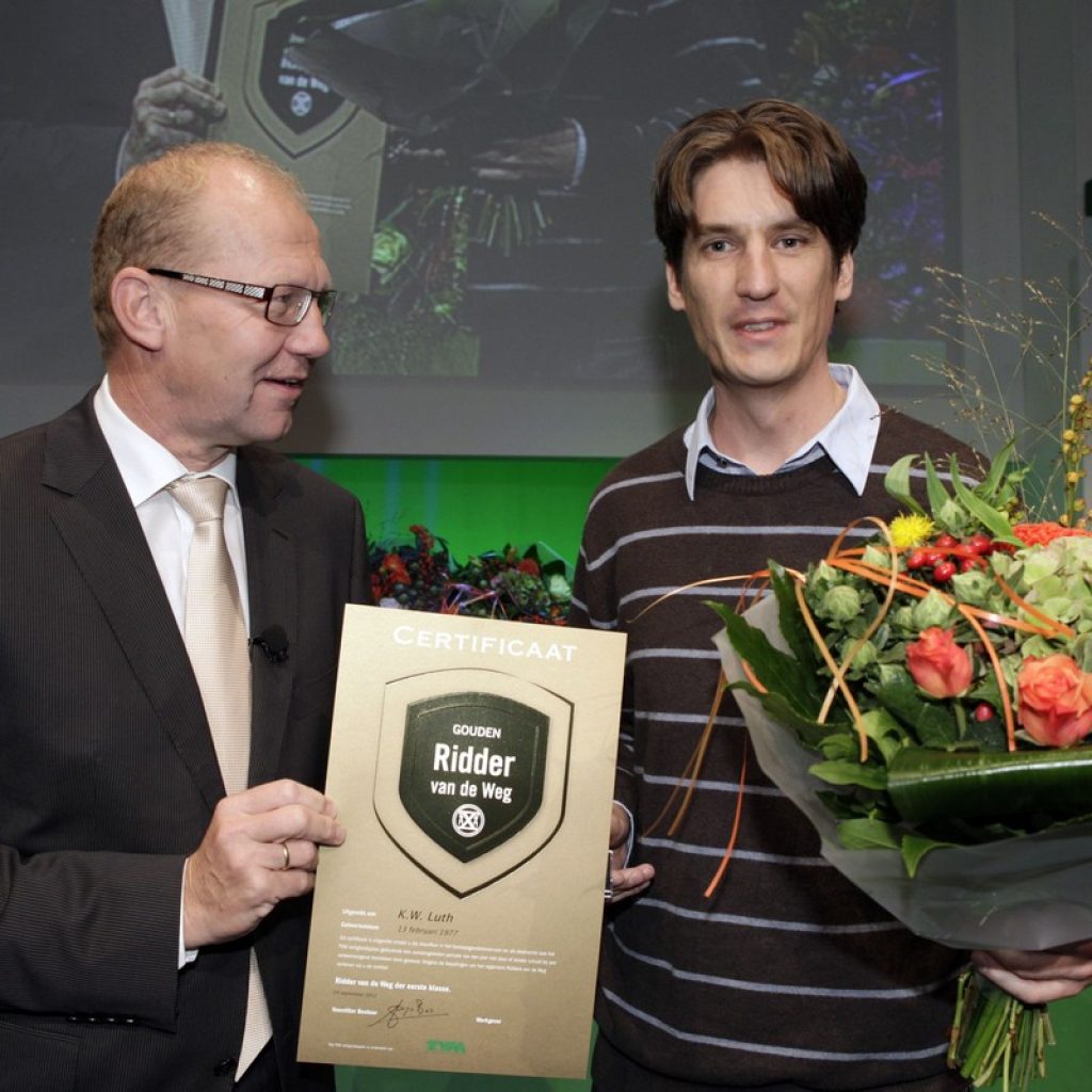 Drie Koller chauffeurs geridderd